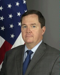 Thomas O. Melia.